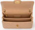 Chanel Mini Flap Bag in Apricot lambskin leather with a gold-tone chain strap and CC turn-lock