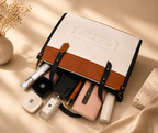 White Coach Tabby Shoulder Bag 26 features a distinct brass "C" logo hardware