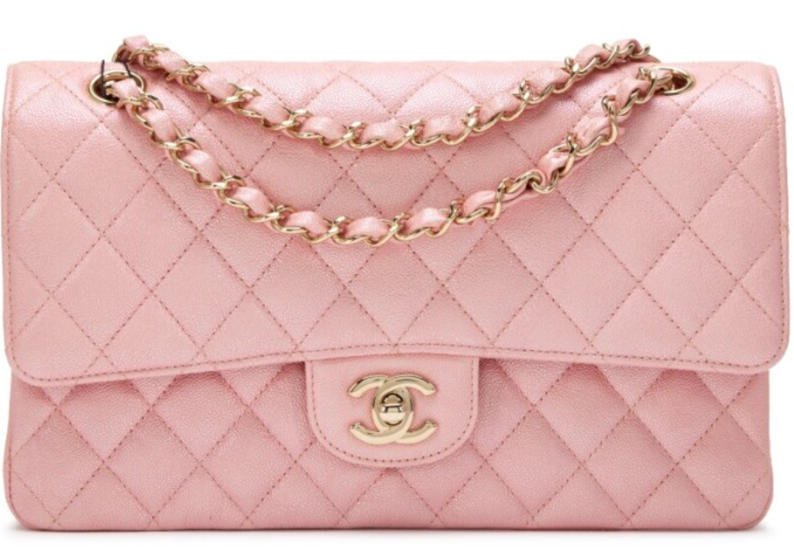 Chanel Mini Flap Bag in Pink lambskin leather with a gold-tone chain strap and CC turn-lock