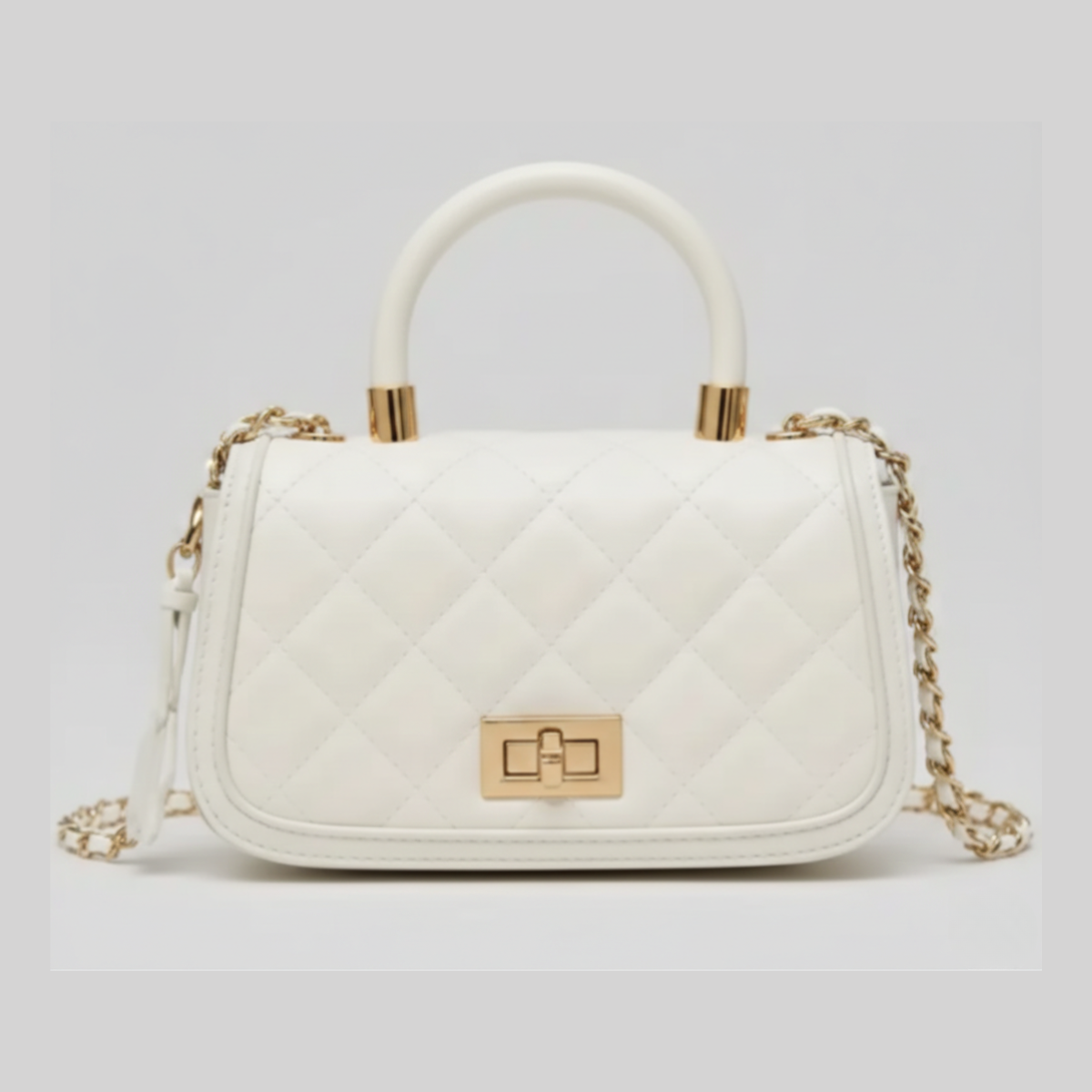 white quilted top-handle bag