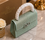 Valentino Garavani Mini VSling handbag entirely covered in rhinestones
