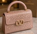 Valentino Garavani Mini VSling handbag entirely covered in rhinestones