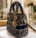 Dior Lady D-Lite bag in the mini size with blue Dior Oblique jacquard embroidery