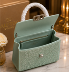 Valentino Garavani Mini VSling handbag entirely covered in rhinestones