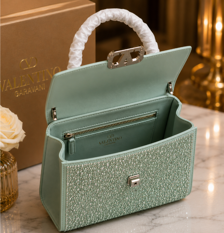 Valentino Garavani Mini VSling handbag entirely covered in rhinestones