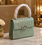 Valentino Garavani Mini VSling handbag entirely covered in rhinestones