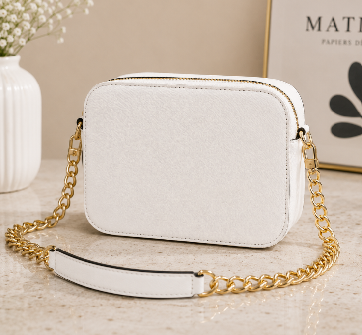 Guess Noelle Crossbody Camera Bag in white textured polyurethane material.